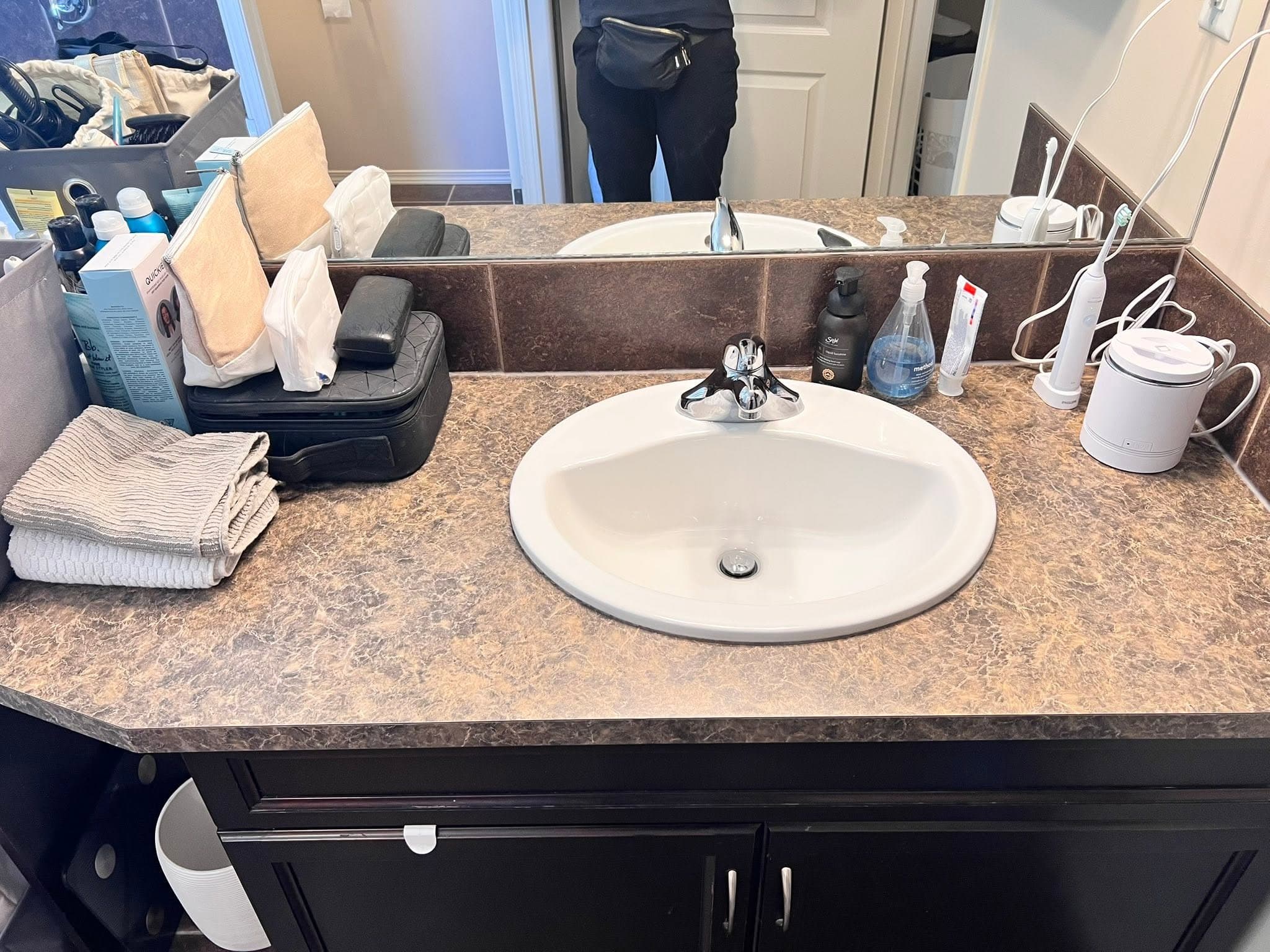 After Bathroom vanity sink and counter before and after detailed cleaning in Red Deer