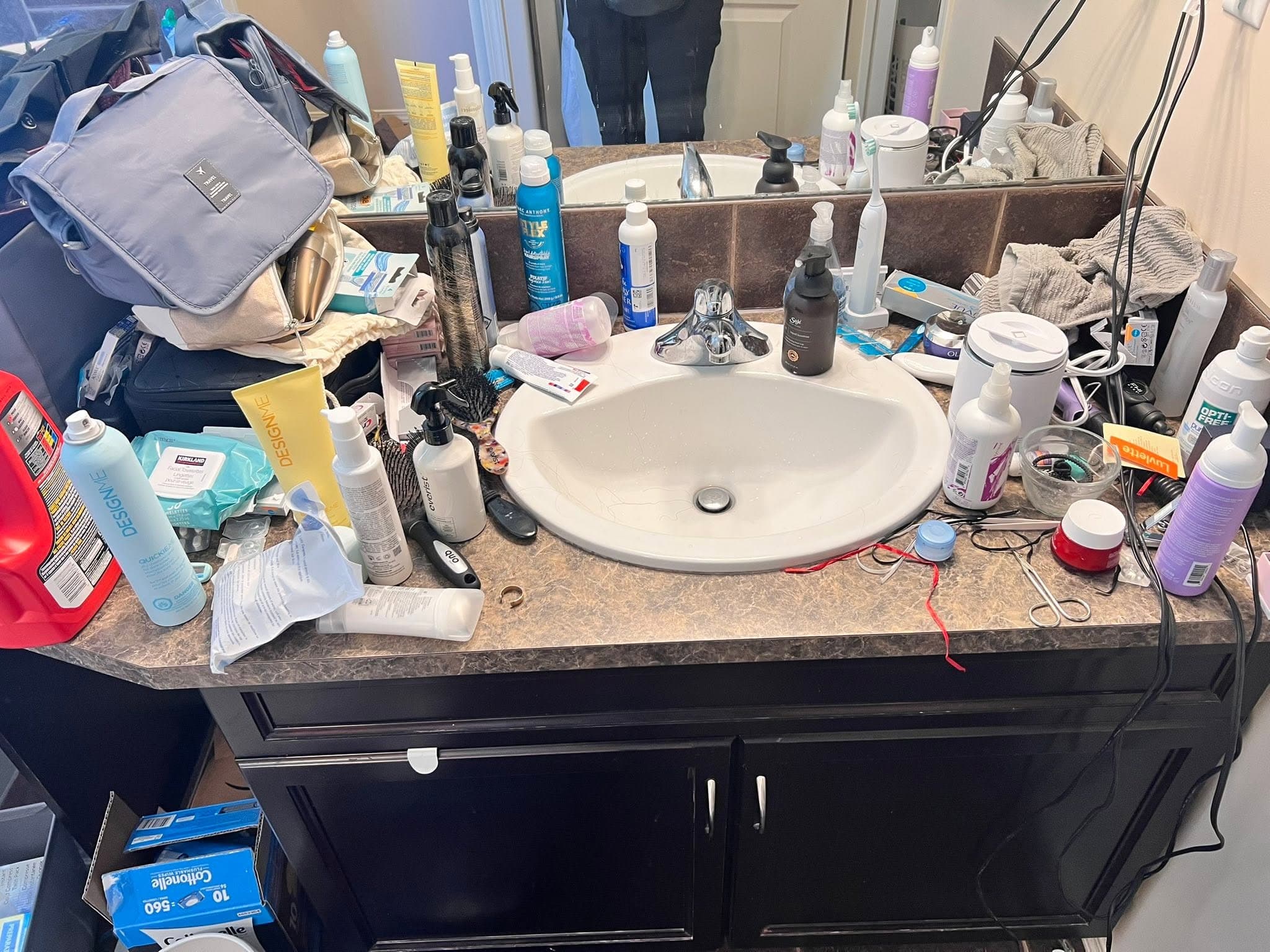 Before Bathroom vanity sink and counter before and after detailed cleaning in Red Deer