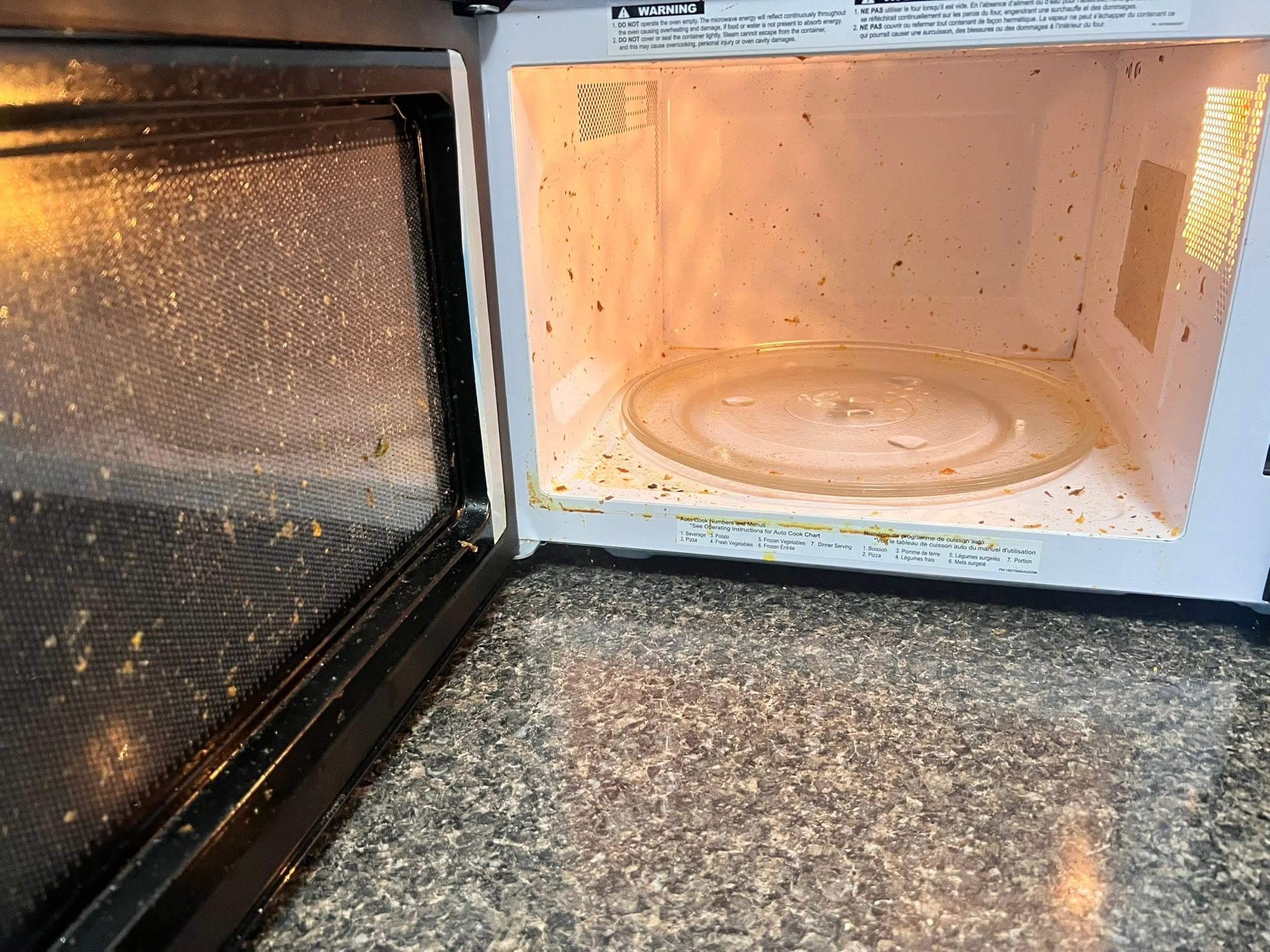 Before Microwave interior before and after deep cleaning in Red Deer
